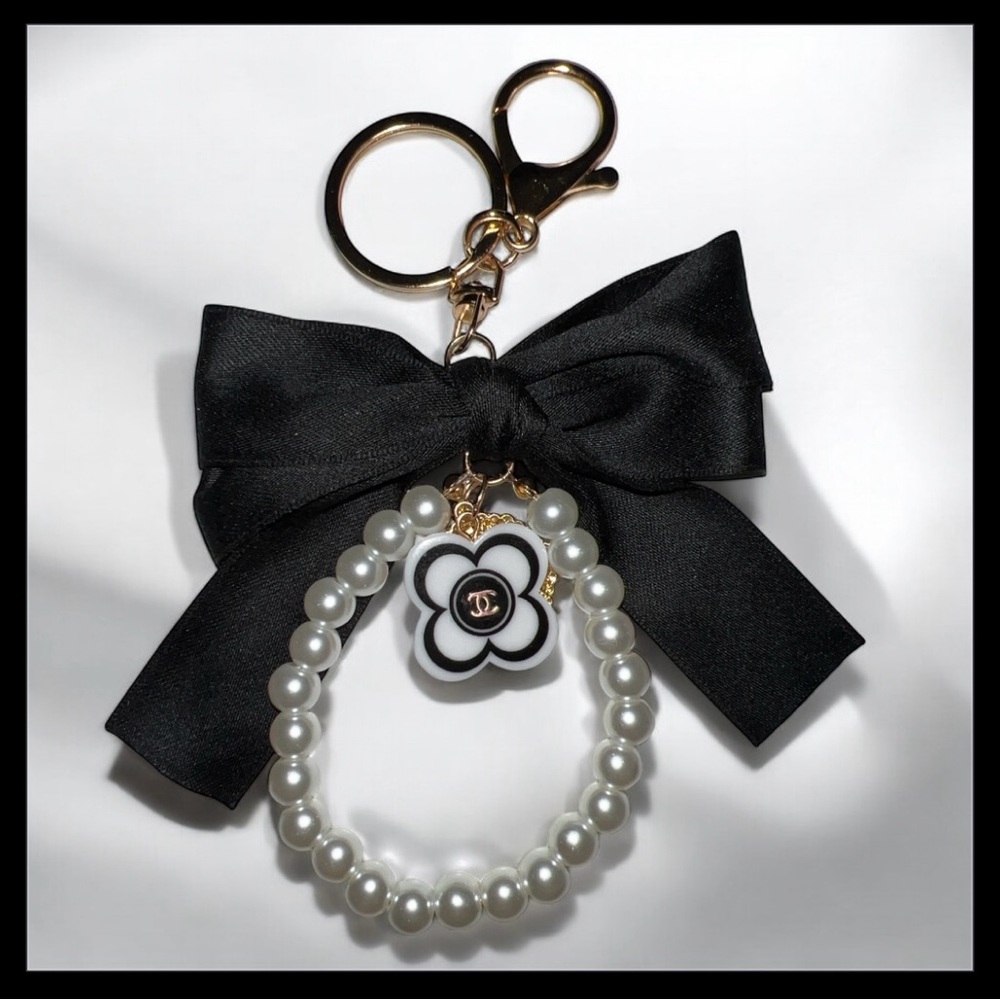 CC LOGO STAMPED  Black and White Key Chain Bag Charm With Bow and Pearl Accents🖤